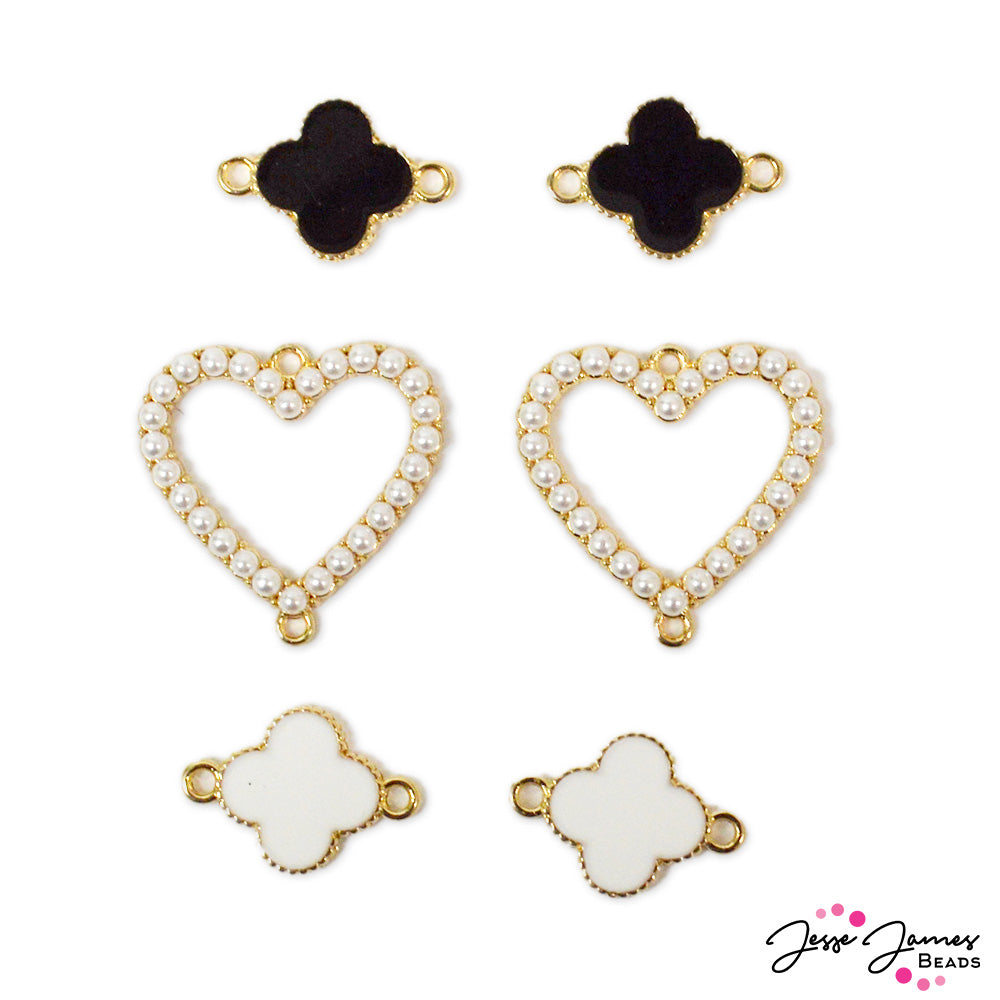 Make a romantic connection with this dreamy set of charm connectors. Each connector features a classic blend of golden metal decorated with black or white accents for a timeless look. Largest piece in mix measures 26mm x 26mm x 3mm. Smallest piece in mix measures 20mm x 14mm x 2mm.
