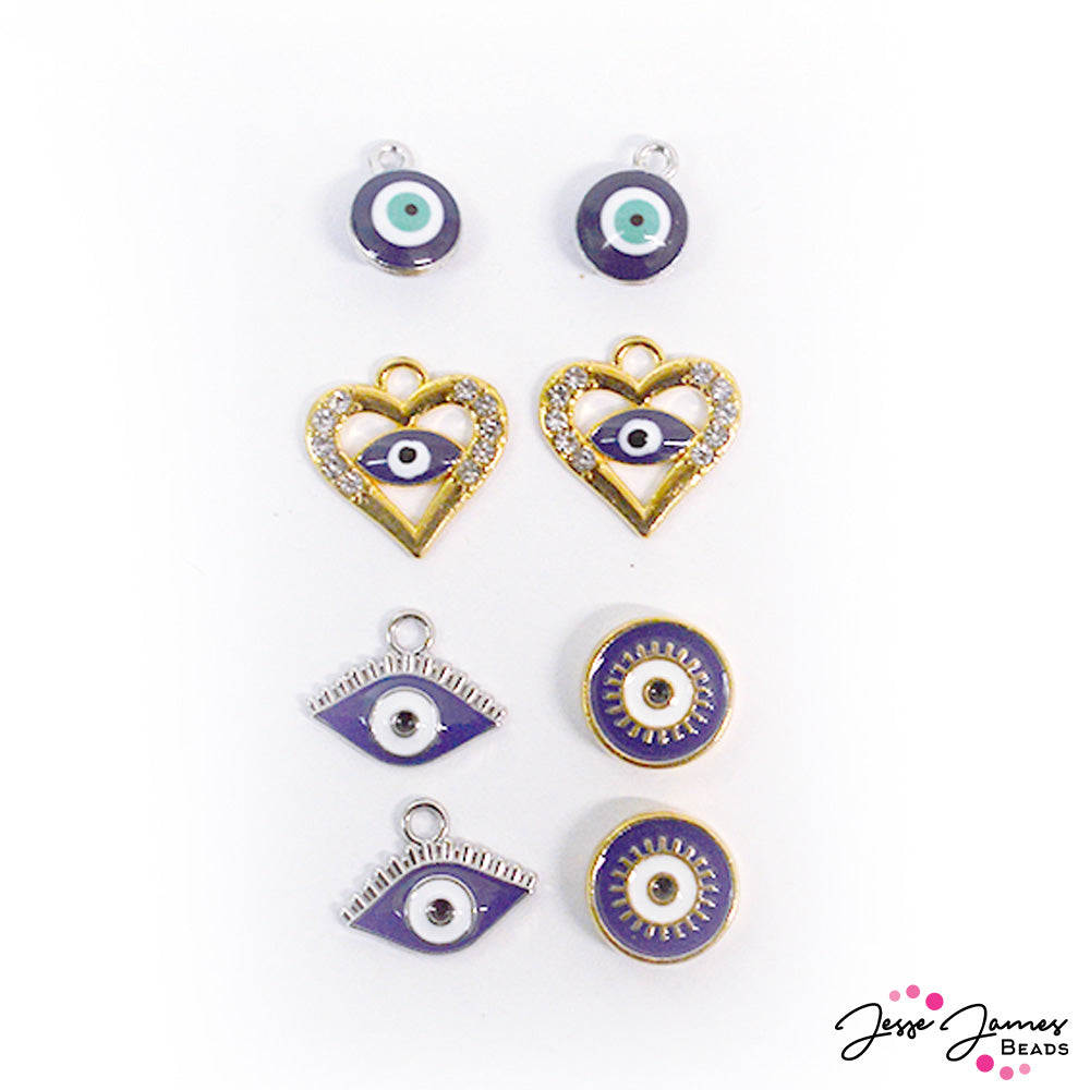 It feels like, somebody's watchin' me! This charm set features Evil Eyes in various styles, includes hearts, dangle charms, focal beads, and more. Largest piece in mix measures 10mm x 10mm x 1mm. Smallest piece in mix measures 10mm x 6mm x 5mm.