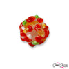 Add abstract florals to your next project with this lampwork focal bead! This poppy-inspired bead features bold red details accented with touches of green and orange. Each bead measures 12mm.