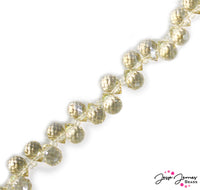 Faceted crystal glass beads in sparkling champagne! Bubble over on these pretty top drilled beads, a perfect match for the JJB Goddess Collection. 80 beads per strand. Each bead measures 10mm x 8mm.