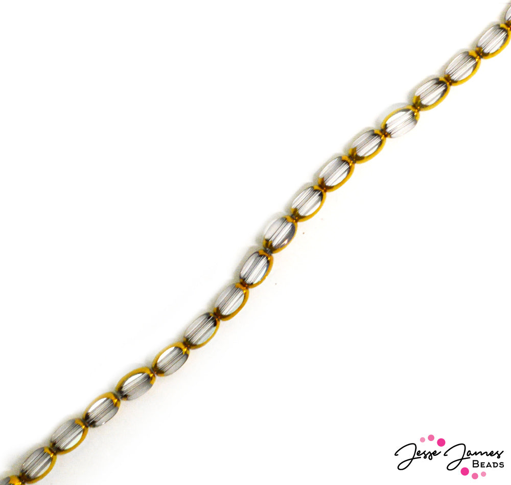 For the glamorous Ghosties. This mini faceted glass oval beads feature a touch of golden trim for an upscale look. Each bead measures 7mm x 4mm x 3mm. Approx. 50 beads on a strand.