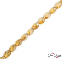 Sweet peach glass crystal beads with ultra electroplate flash finish! Shape is oval cushion with facets, facets, facets. Like to glimmer? These are your beads. Approx 60 beads per string. Each faceted oval bead measures 11mm x 8mm x 2mm. Approx.