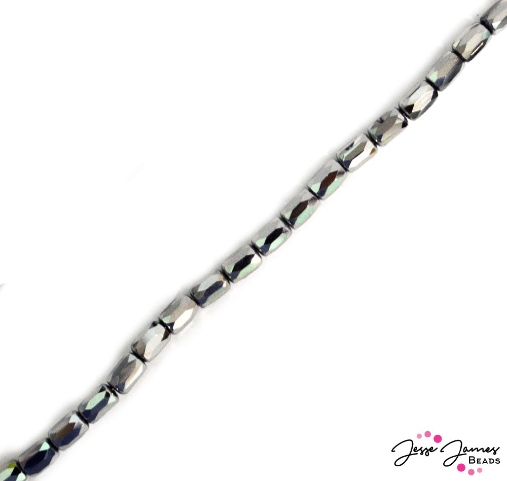 Surf's up! These silver metallic glass beads are slicker than slick. Add the ultimate flash to your jewelry projects with faceted silver glass spacer beads.. Approx 80 Beads per strand. Each bead measures 4mm x 6mm.