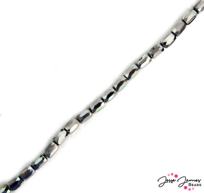 Surf's up! These silver metallic glass beads are slicker than slick. Add the ultimate flash to your jewelry projects with faceted silver glass spacer beads.. Approx 80 Beads per strand. Each bead measures 4mm x 6mm.