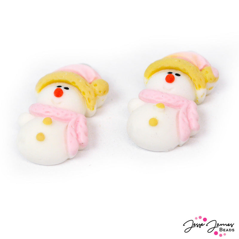 Cozy up with these adorable pink clad snowmen charms! Perfect for Winter jewelry design, these little snowmen are lightweight, perfect for necklaces, earrings, and more. Each snowman charm measures 29x15x8mm, Hole: 2mm