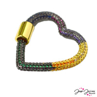 Who says a clasp is only a clasp? This bold multicolored heart features a rainbow of cubic zirconia and a  large focal twist clasp perfect for creating a secure connection. Don't keep your clasp hidden in the back, this bold clasp doubles as a pendant for a seamless design. Great for use with paperclip or other large link chain as a focal or as your finishing clasp. Each clasp measures 28mm x 29mm x 7mm.