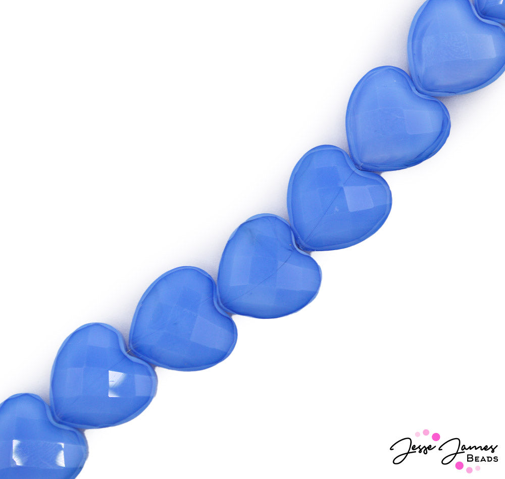 Don't feel blue, add a little love to your next jewelry creation with these faceted glass heart beads. These adorable hearts measure 14mm x 14mm x 6mm. Each strand includes 50 heart beads. Hole size measures approx 1mm.