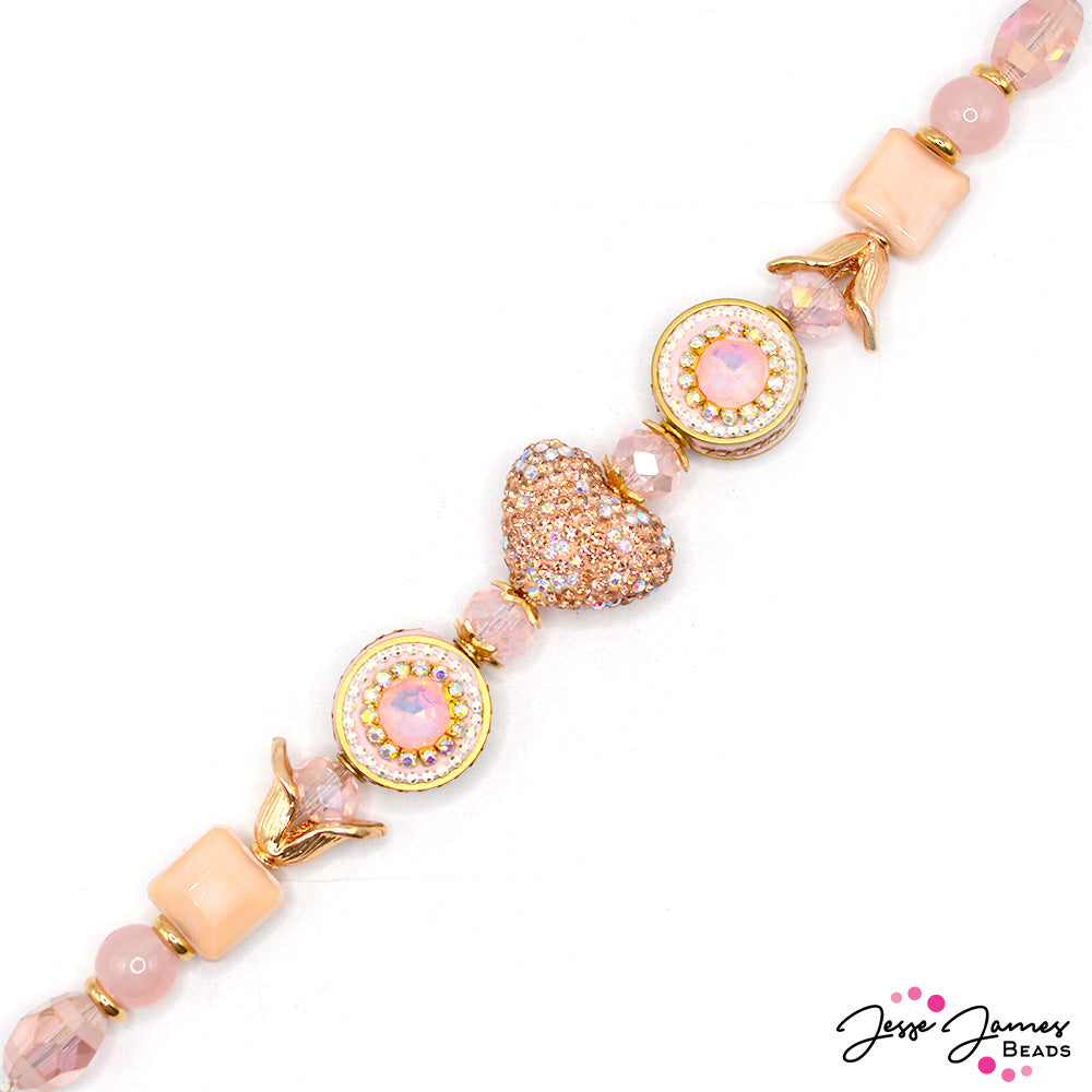 Inspired by Peach Fuzz, Pantone's color of the year, reimagined with Jesse James Beads