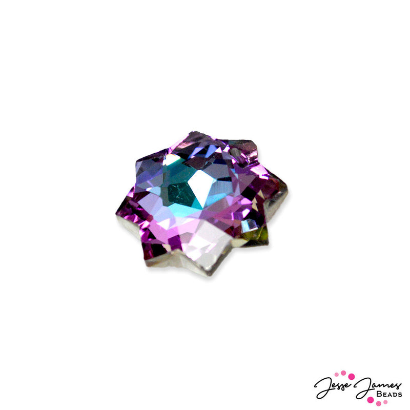 Follow your star to unlock new design inspiration. This new glass pendant features the colors of the famous aurora borealis, and is sure to add a touch of glamor to whatever design it is added to. Measures 18mm x 18mm x 8mm. Sold 1 pendant per order.