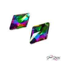 Dive into murky waters and discover mysterious treasures. These faceted glass pendants feature a unique blend of purple, pink, blue, and green. Measures 23mm x 14.5mm x 7mm. Sold in 2 pendants per order.